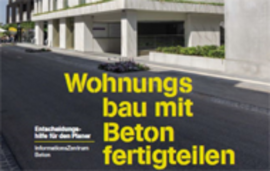 Moderner Wohngebäudekomplex aus Betonfertigteilen mit textlicher Beschriftung im Vordergrund zur Informationsvermittlung über wohnungsbauende Fertigteiltechnik.